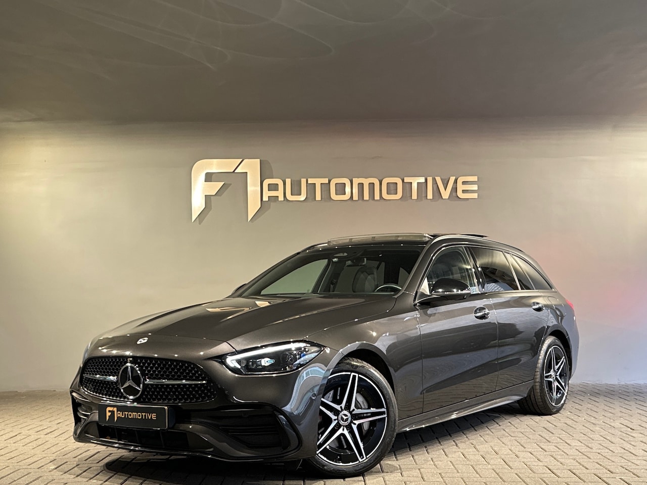 Mercedes-Benz C-klasse Estate - 300 e AMG Pano|Sfeer|HuD|Keyless - AutoWereld.nl