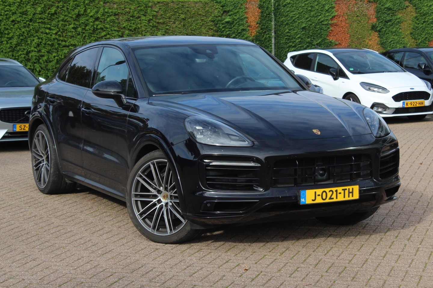 Porsche Cayenne Coupé - 3.0 E-Hybrid / Trekhaak / Panoramadak / Camera / 22'' / CarPlay / Sportdesign+Chrono / Luc - AutoWereld.nl