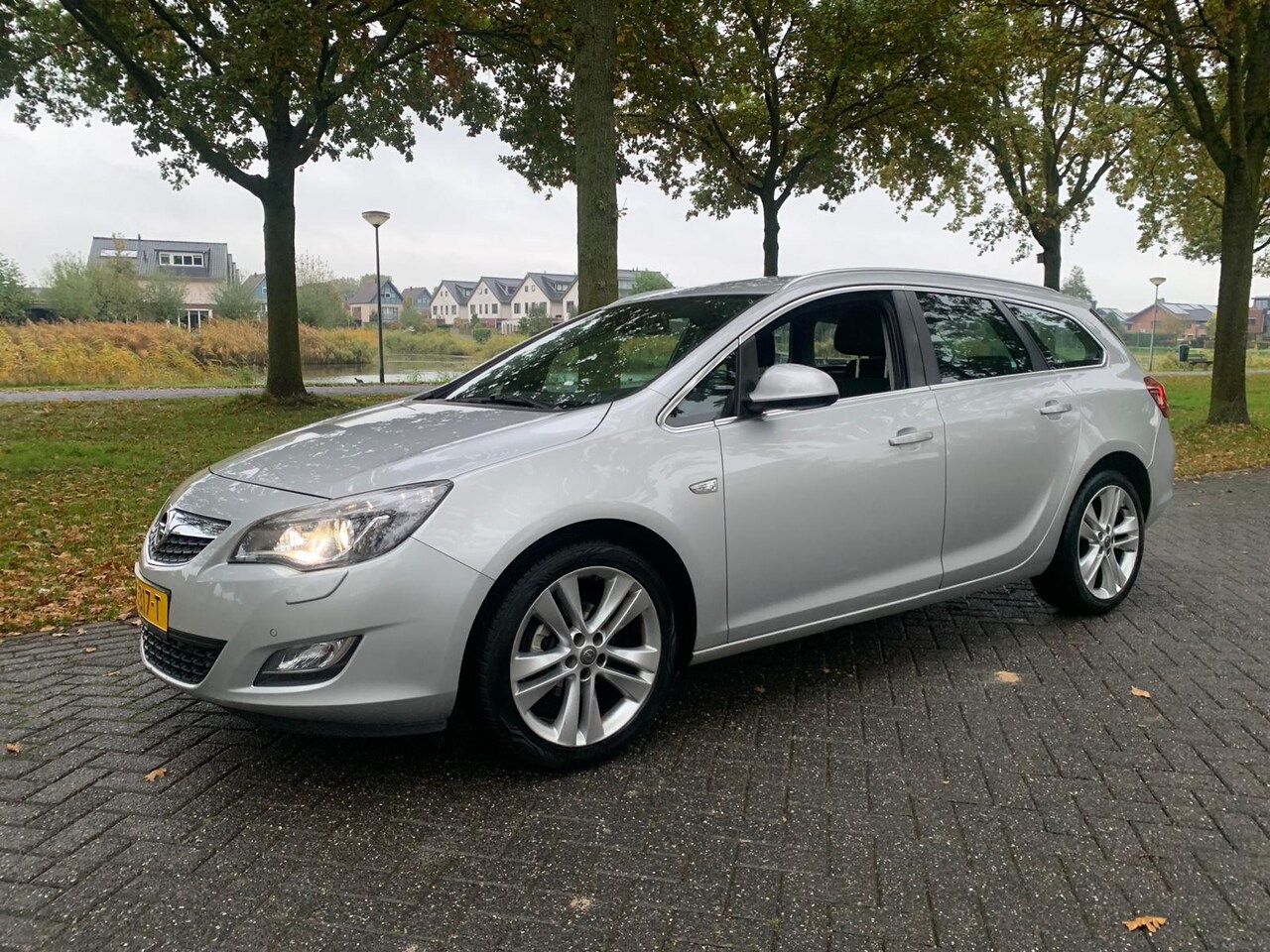 Opel Astra Sports Tourer - 1.4 Turbo Sport 1.4 Turbo Sport - AutoWereld.nl