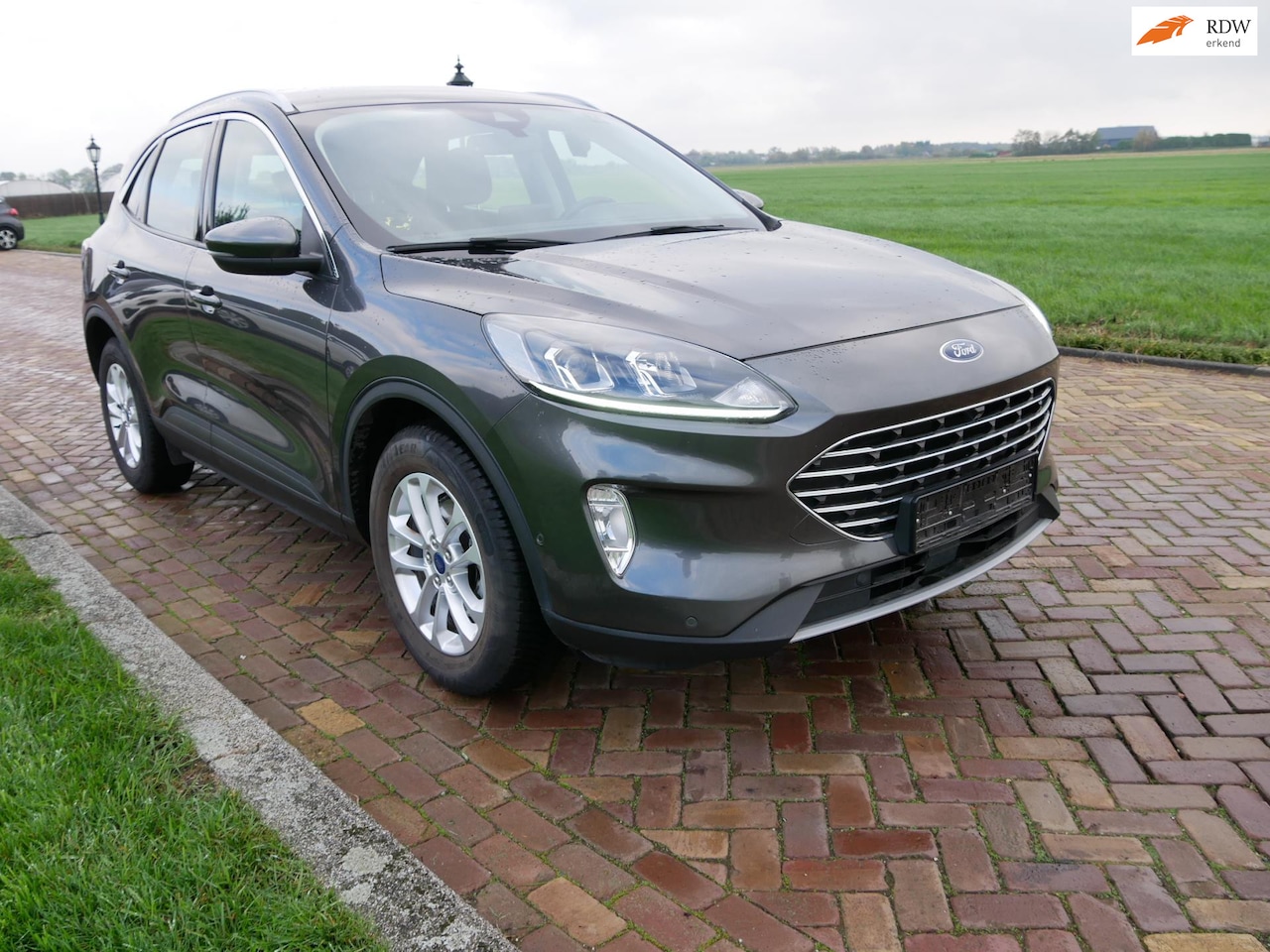 Ford Kuga - 1.5 EcoBlue 88kW Titanium AUT. CLIMA NAVI CAMERA ** 12499 NETTO ** - AutoWereld.nl