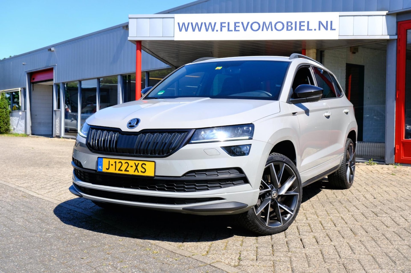 Skoda Karoq - 1.5 TSI ACT DSG 150PK Sportline Virtual|1e Eig|LED|Navi|Camera|Keyless - AutoWereld.nl