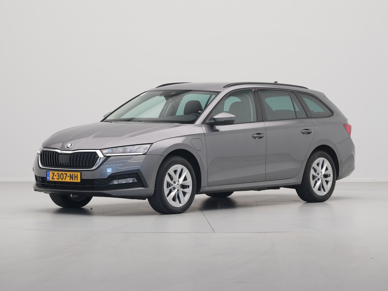 Skoda Octavia Combi - 1.4 TSI iV 204pk PHEV Business Edition Navigatie Wegkl.trekhaal Pdc Virtual Cockpit Carpla - AutoWereld.nl