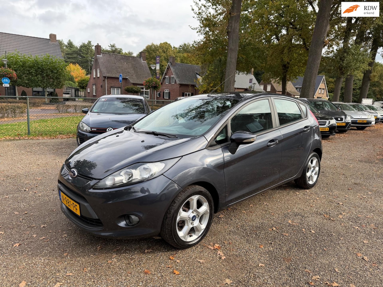 Ford Fiesta - 1.25 Ghia 1.25 Ghia - AutoWereld.nl