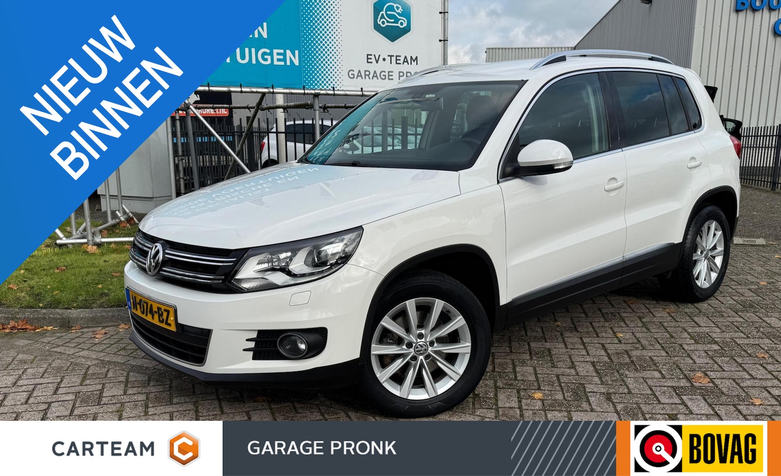 Volkswagen Tiguan - 1.4 TSI Sport&Style NAVI/PDC/XENON/CRUIS - AutoWereld.nl