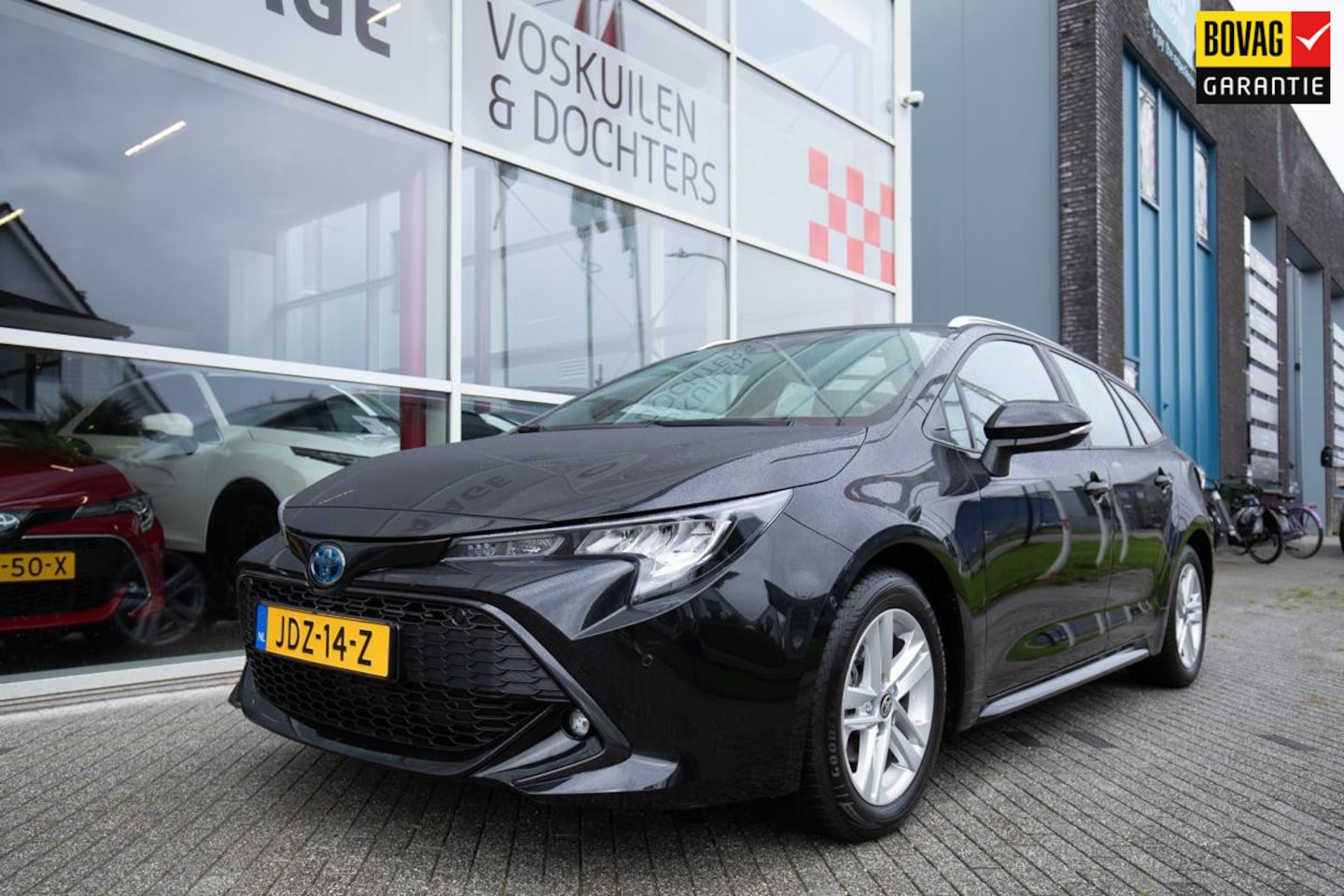 Toyota Corolla Touring Sports - 1.8 Hybrid Dynamic MY22 | Stoelverwarming | Carplay | Camera - AutoWereld.nl