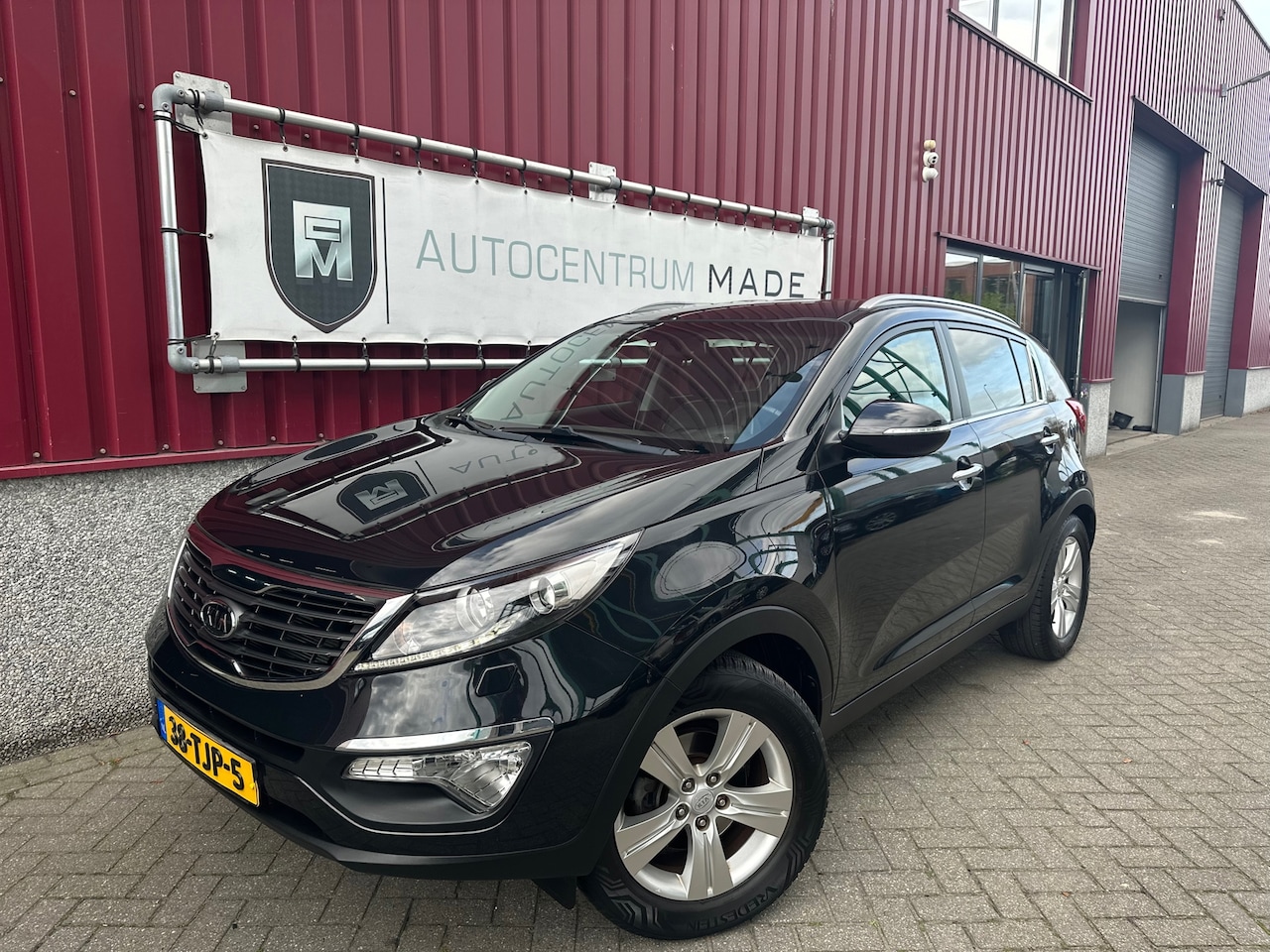 Kia Sportage - 1.6 GDI ISG X-clusive // Clima // Navi // Cruise control // PDC // Trekhaak - AutoWereld.nl