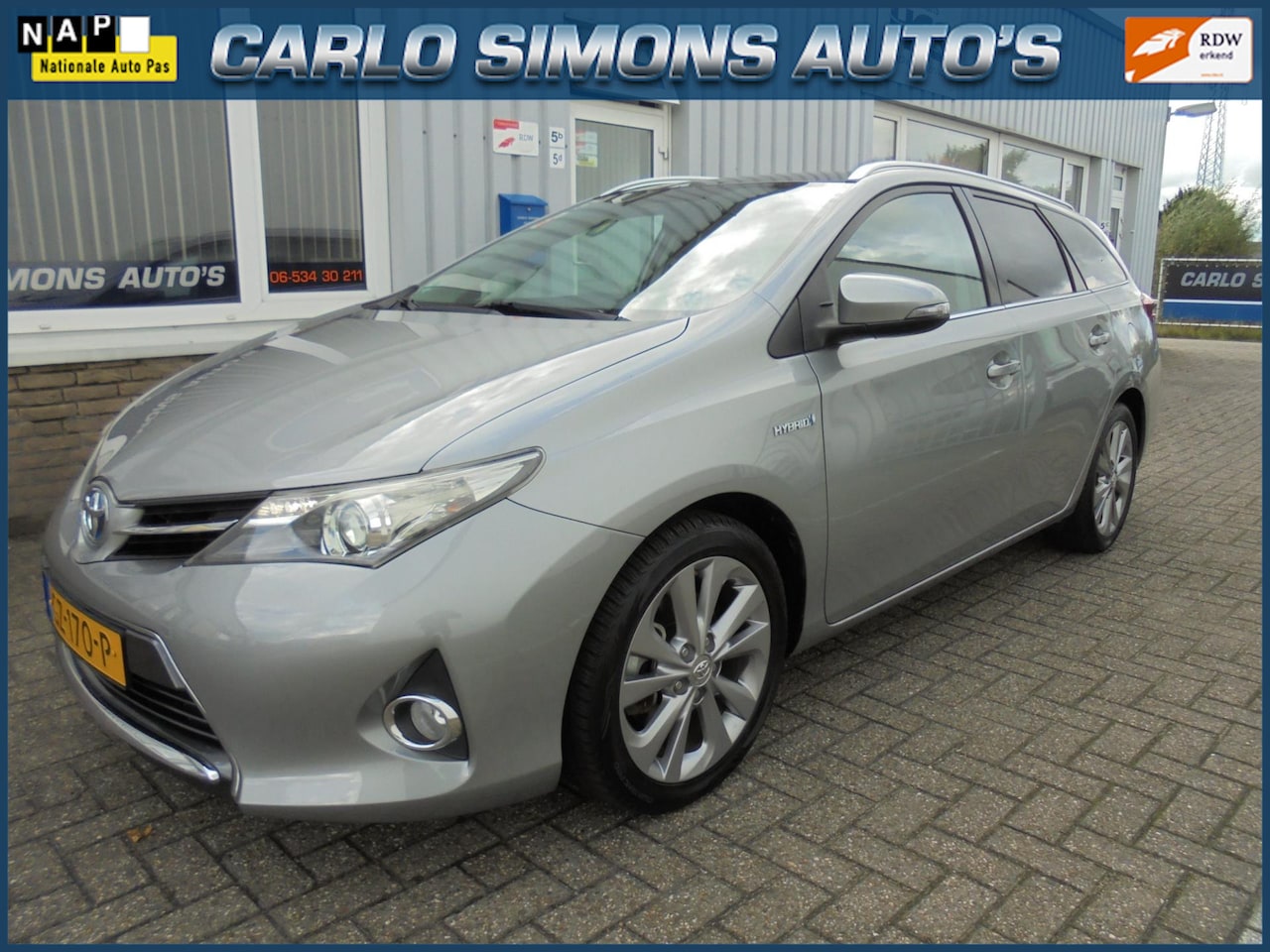 Toyota Auris Touring Sports - 1.8 Hybrid/navi/panorama - AutoWereld.nl