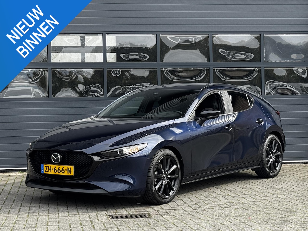 Mazda 3 - 2.0 E-SKYACTIV-G M HYBRID COMFORT I BOSE AUDIO I APPLE CARPLAY I ACHTERUITRIJCAMERA I ADAP - AutoWereld.nl