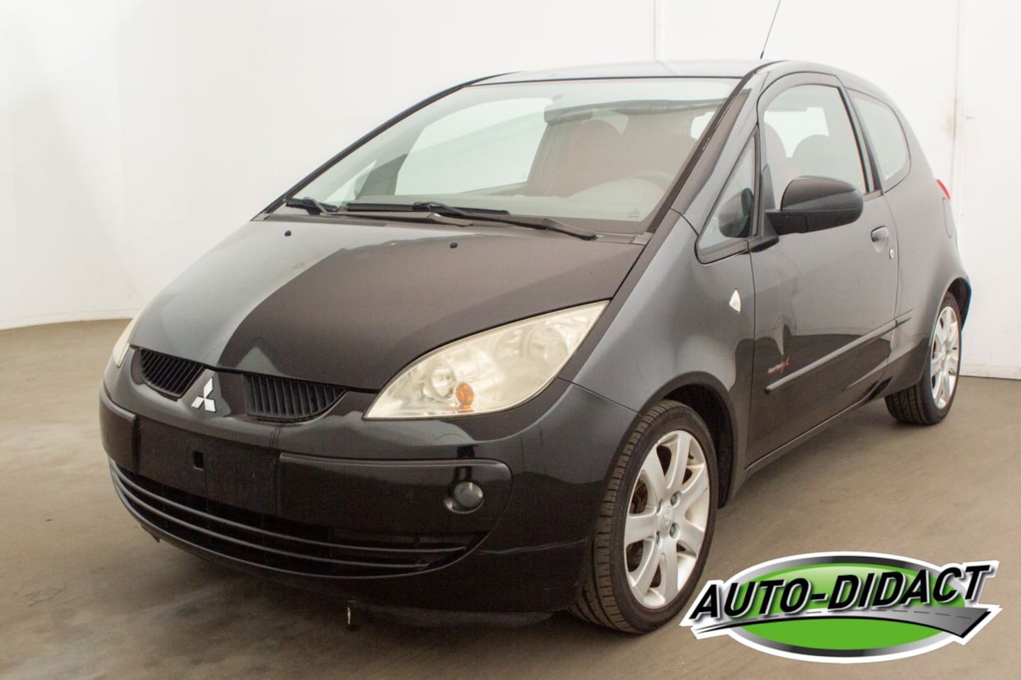 Mitsubishi Colt - 1.4i Airco - AutoWereld.nl