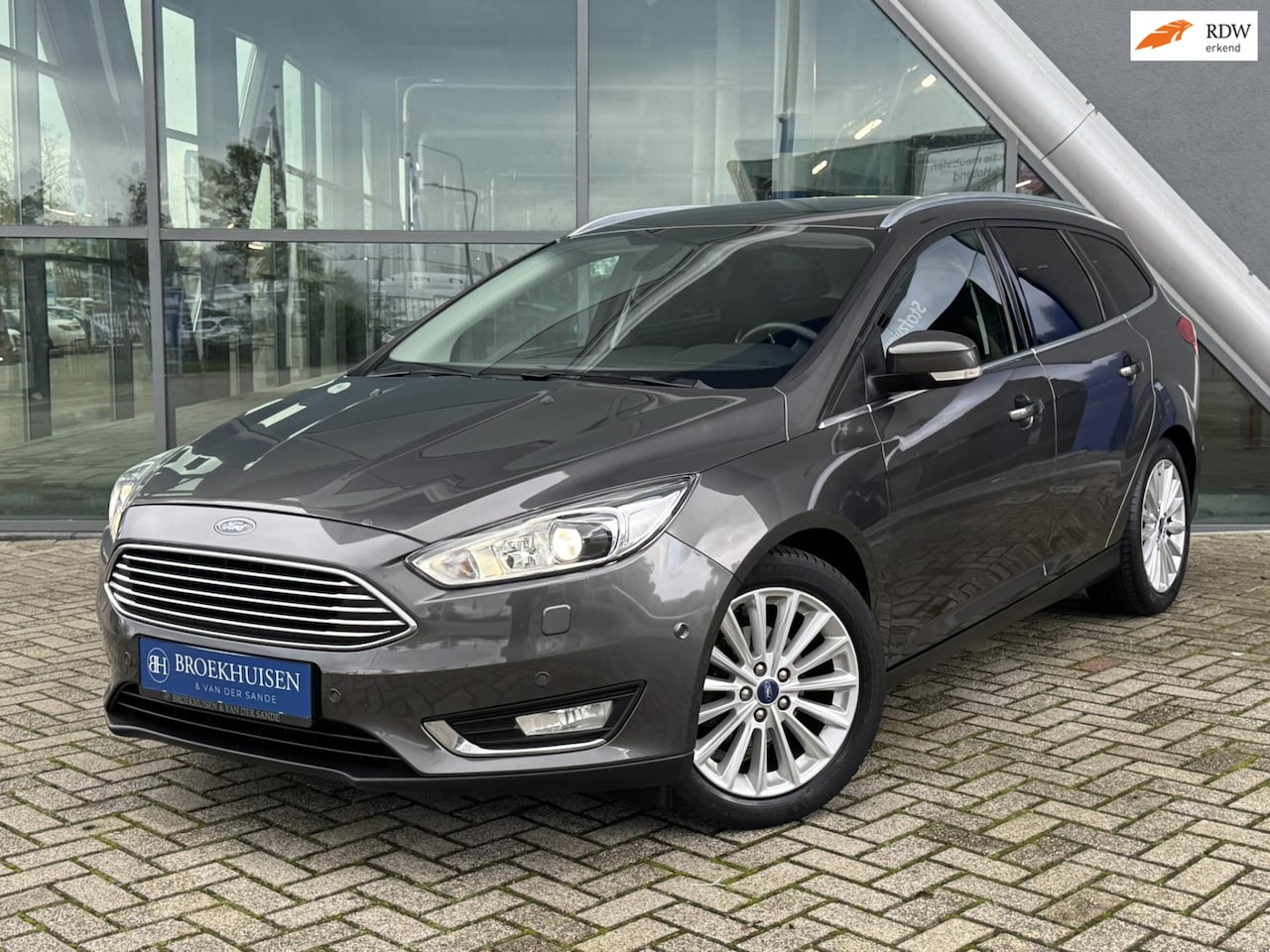 Ford Focus Wagon - 1.0 Titanium Edition125pk Cruise Control / Navigatie / Climate control - AutoWereld.nl