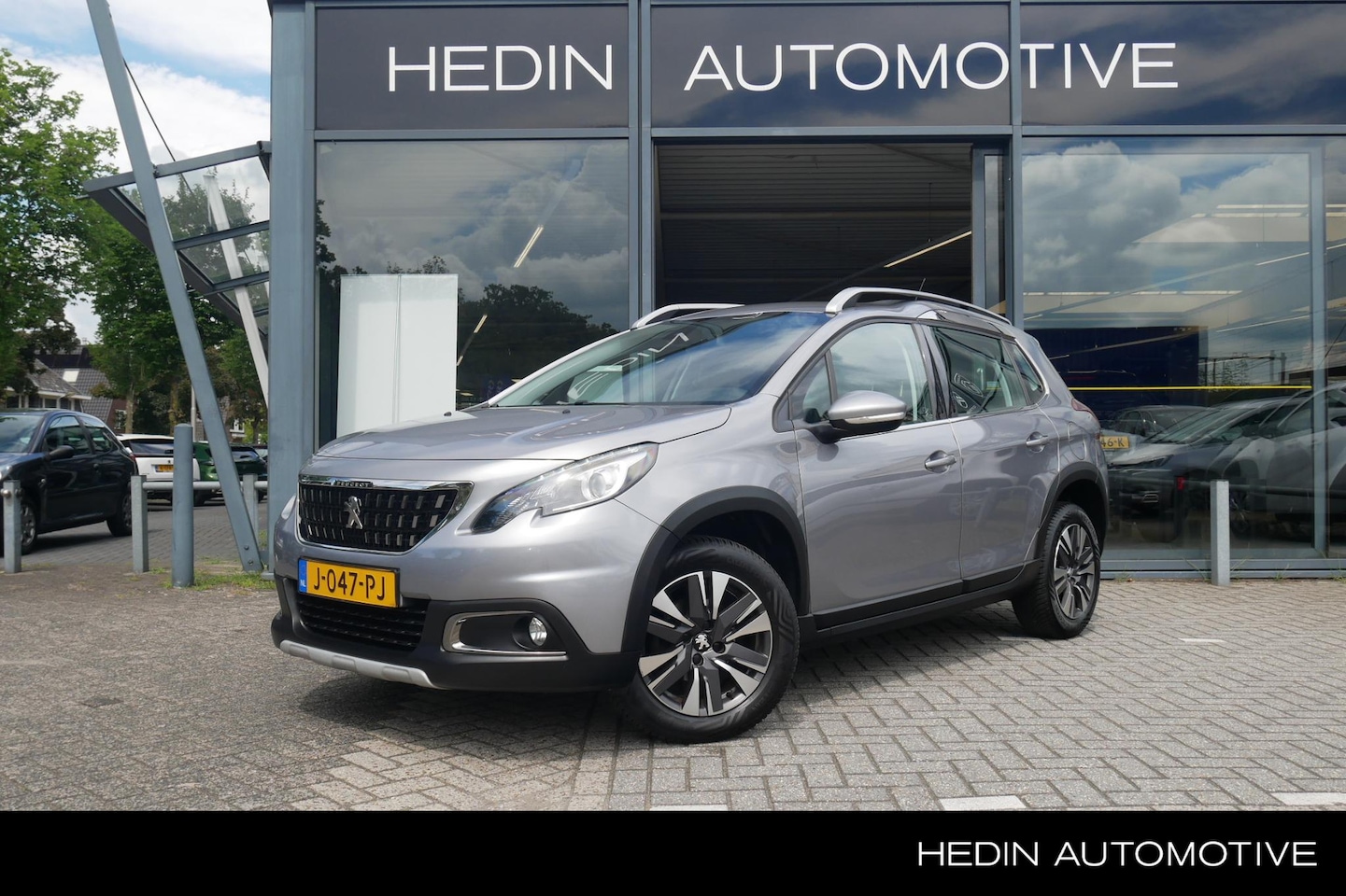 Peugeot 2008 - 1.2 Allure 82 pk Turbo | Navigatie | Climate Control | Cruise Control | All Season Banden - AutoWereld.nl