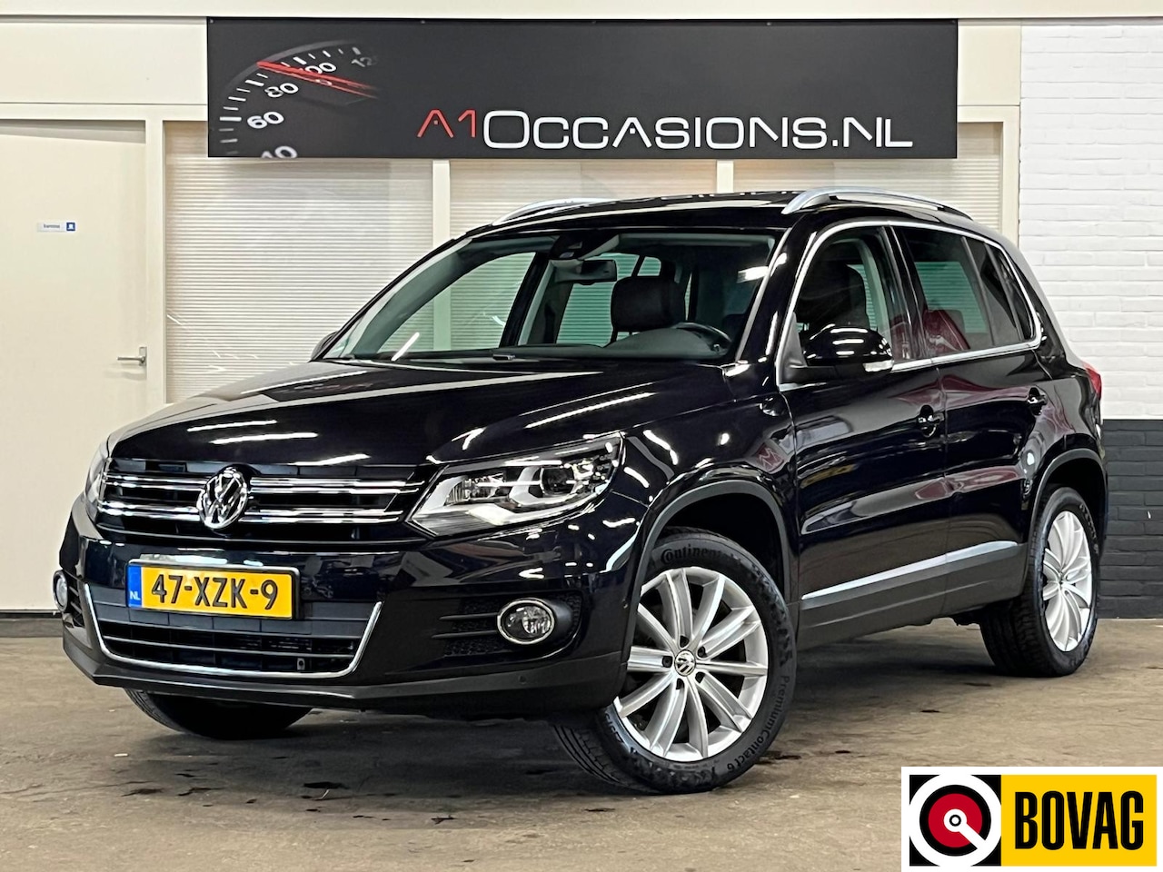 Volkswagen Tiguan - 2.0 TSI Sport&Style 4Motion + STOELVERWARMING + LEDER - AutoWereld.nl