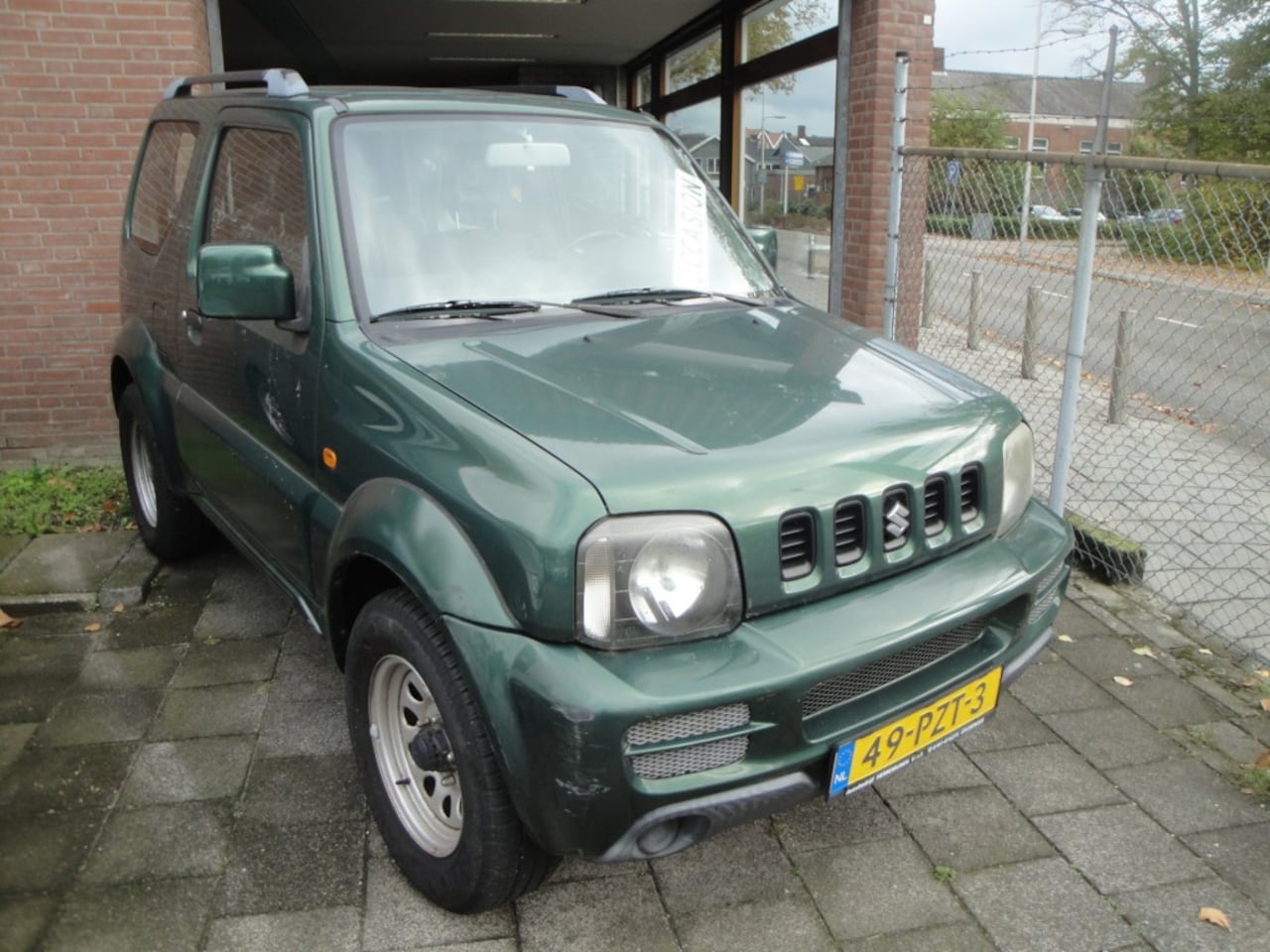 Suzuki Jimny - TOP 1.3 JLX (1e Eig./2011/86.600KM) - AutoWereld.nl