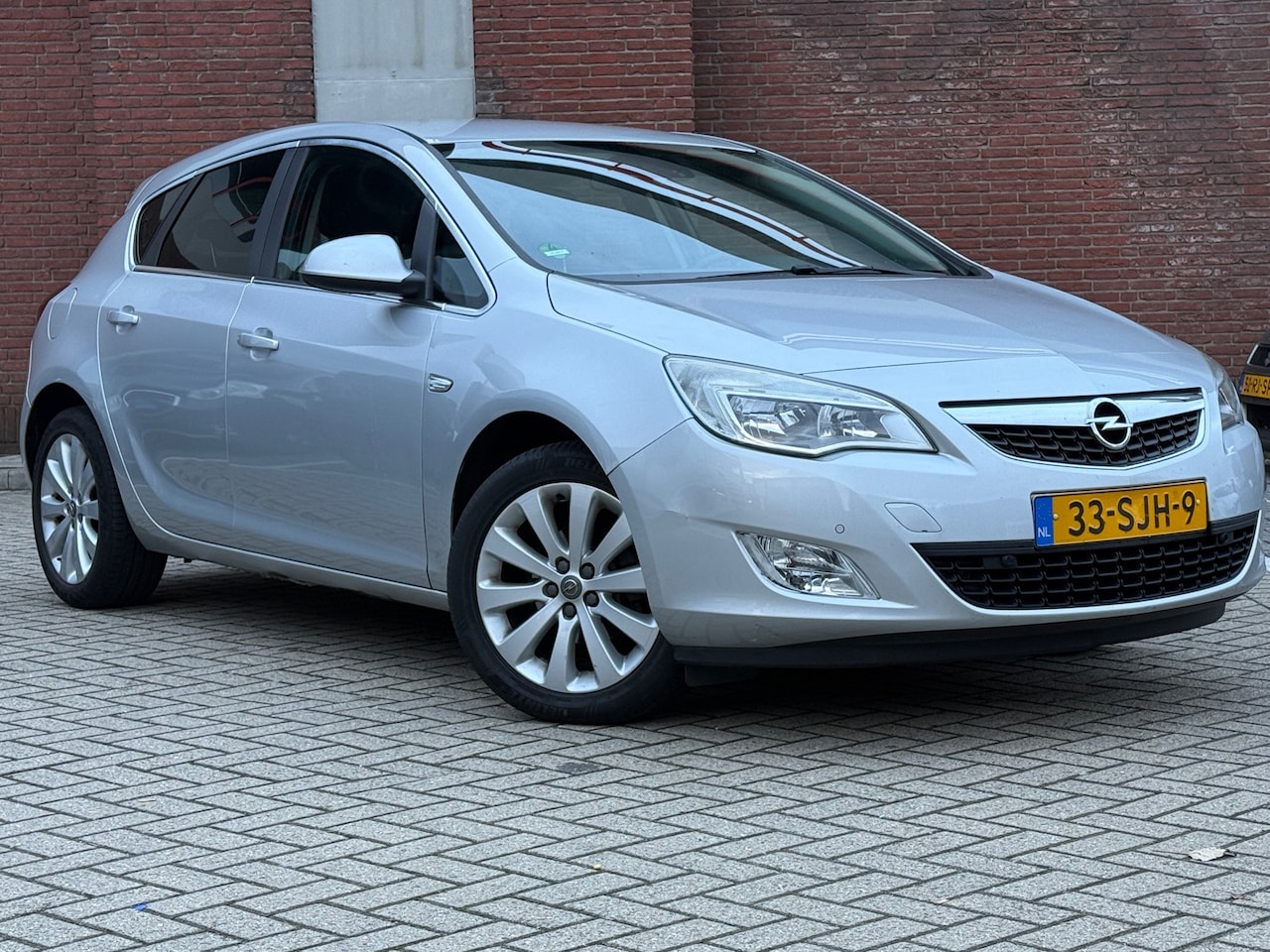Opel Astra - 1.4 Turbo Cosmo|5DRS|AIRCO|NAVI|GOED-ONDERHOUDEN - AutoWereld.nl
