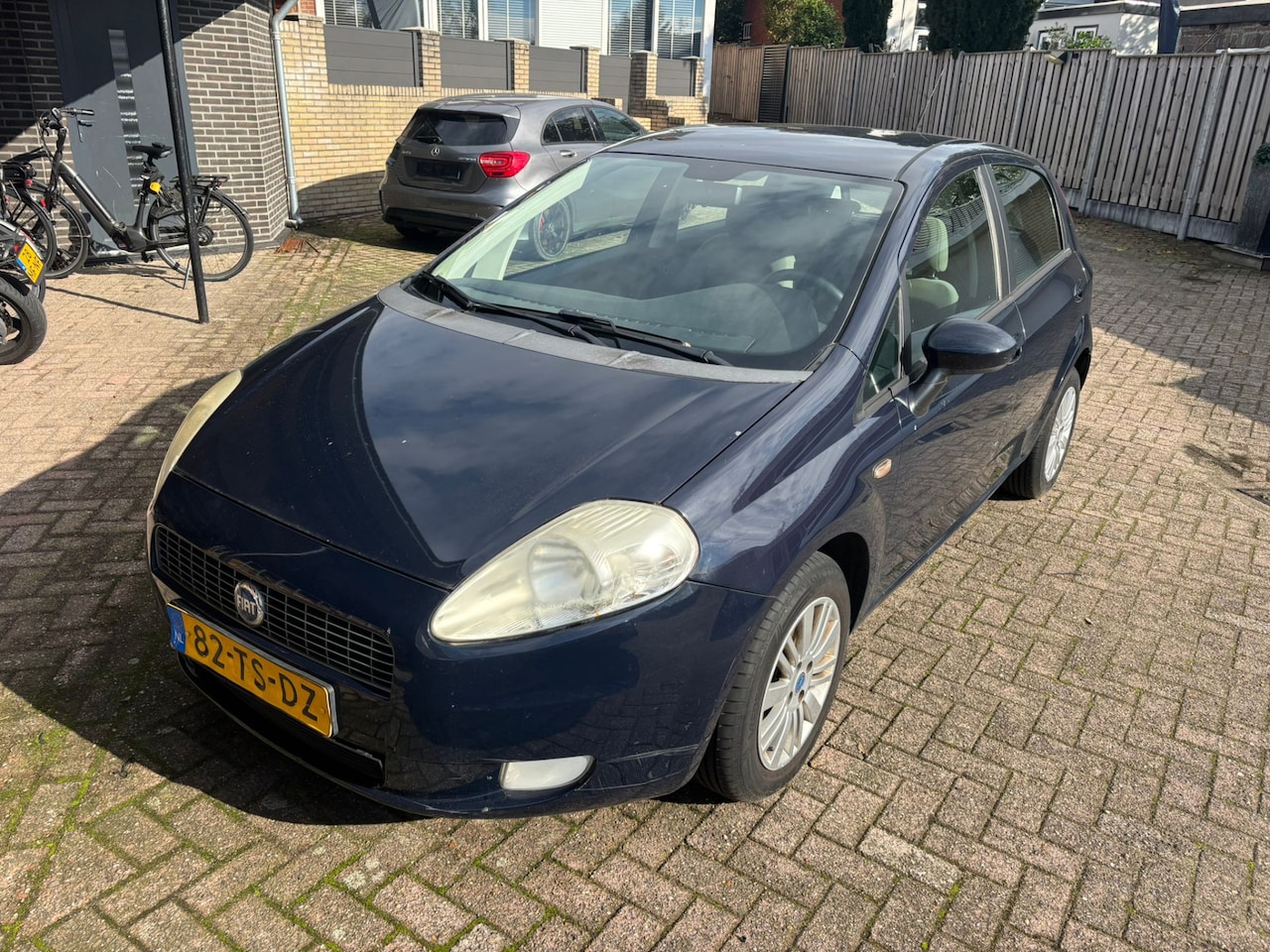 Fiat Grande Punto - 1.4 Dynamic NAP lage km stand airco - AutoWereld.nl