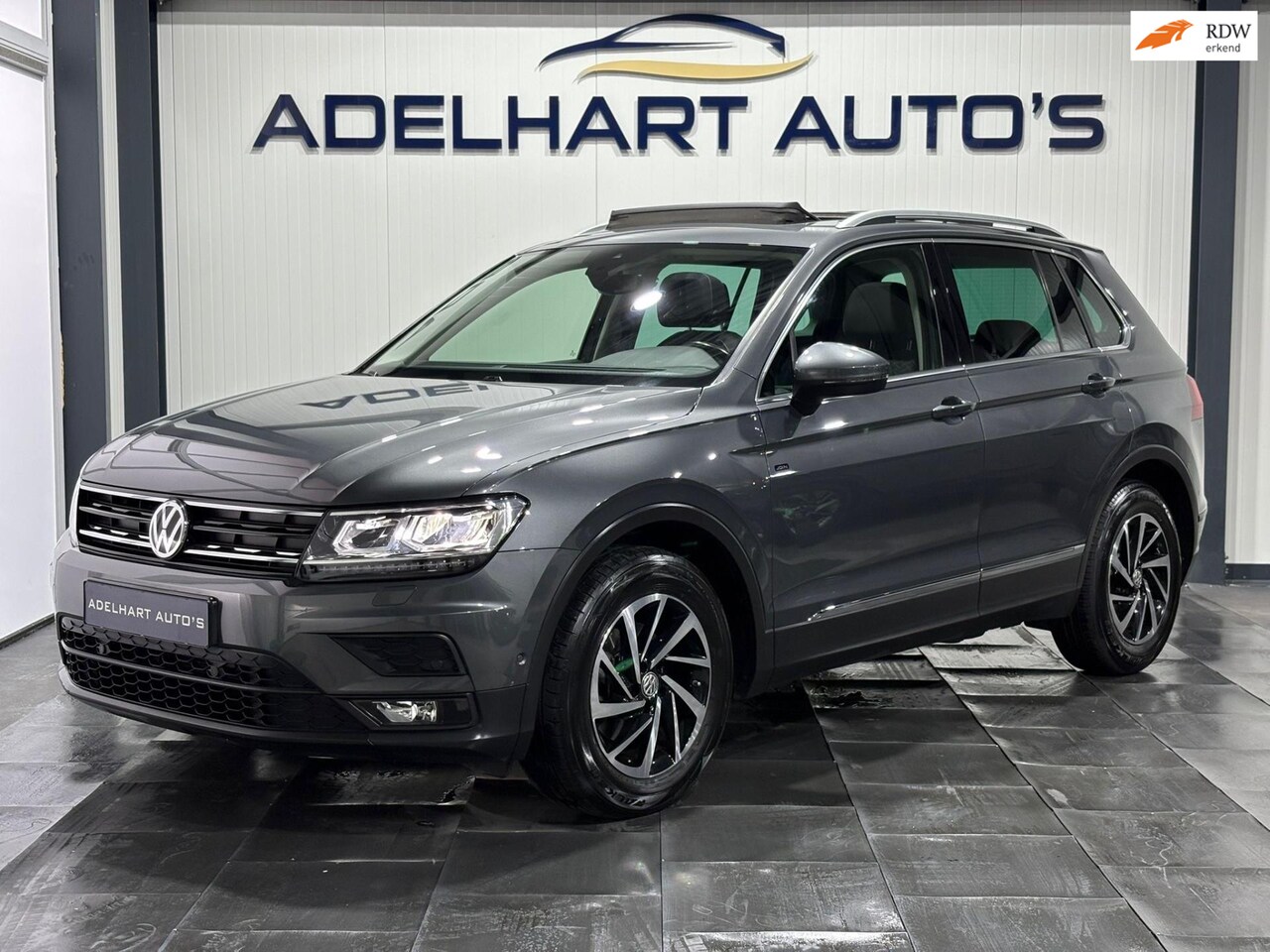 Volkswagen Tiguan - 1.5 TSI Comfortline 150 PK / Panorama dak / Navigatie full map / Camera / Cruise control / - AutoWereld.nl