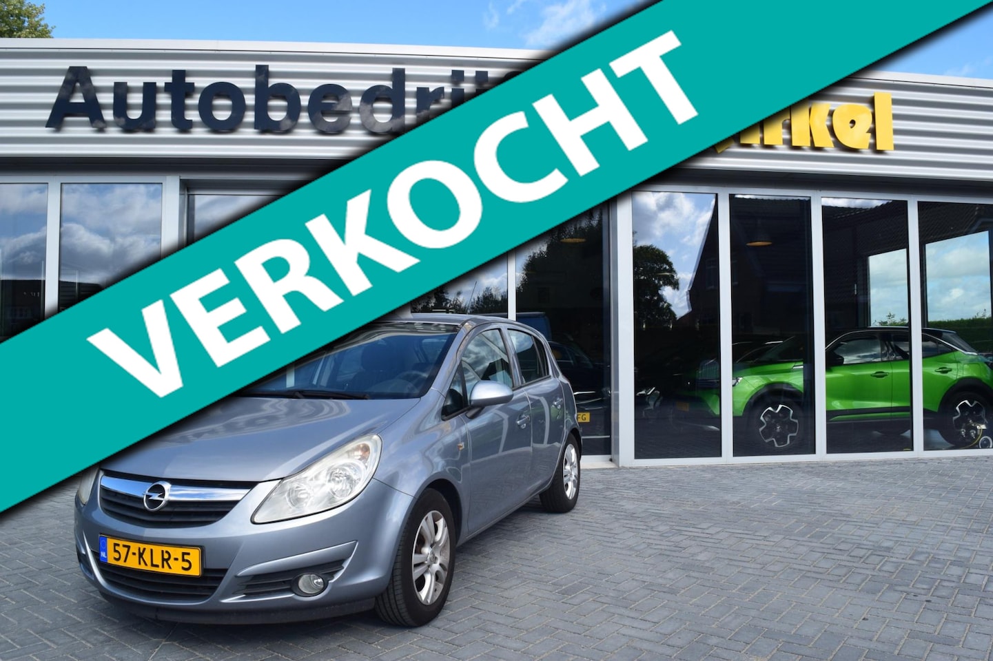 Opel Corsa - 1.4-16V Enjoy van 4450 nu voor 3995 - AutoWereld.nl