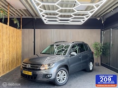 Volkswagen Tiguan - 1.4 TSI Sport&Style | PDC | Camera | Navi
