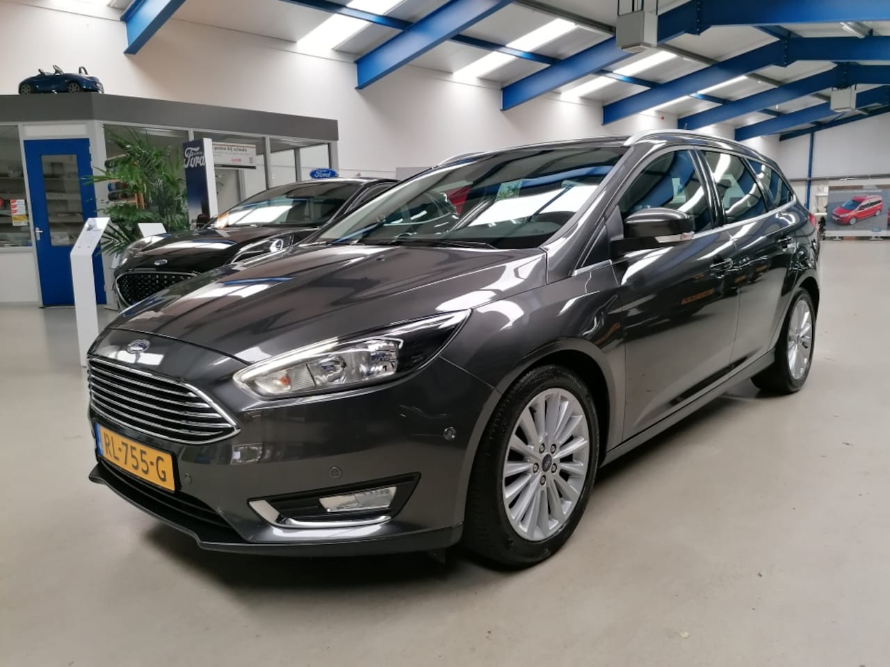 Ford Focus Wagon - 125pk Titanium (trekhaak) - AutoWereld.nl