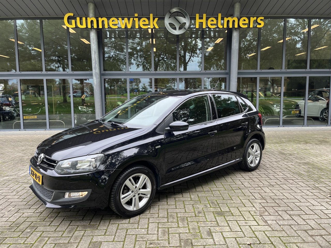 Volkswagen Polo - 1.2 Easyline | ALL SEASON | BLUETOOTH | CLIMA | CRUISE | NAVI | PDC | STOELVERW. - AutoWereld.nl