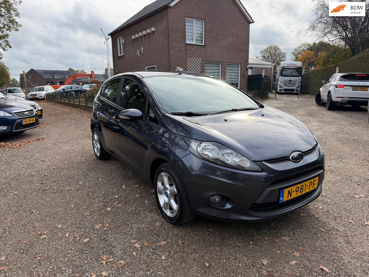Ford Fiesta - 1.25 Ghia 1.25 Ghia - AutoWereld.nl