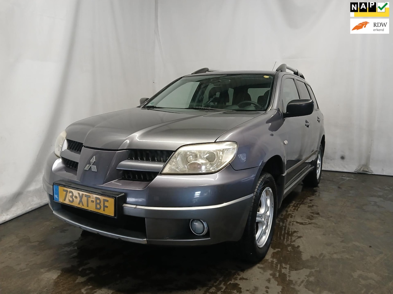 Mitsubishi Outlander Sport - 2.0 Invite+ - Roest - Schade - AutoWereld.nl