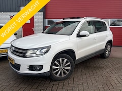 Volkswagen Tiguan - 1.4 TSI Sport&Style TREKHAAK / PANORAMADAK / XENON / STOELVERW / NAVI / CLIMA / PDC / CRUI
