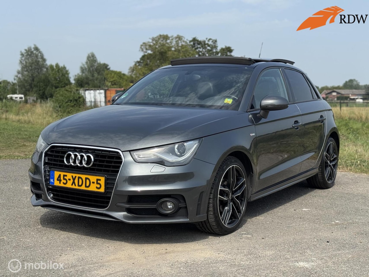 Audi A1 Sportback - 1.2 TFSI Attraction Pano - AutoWereld.nl
