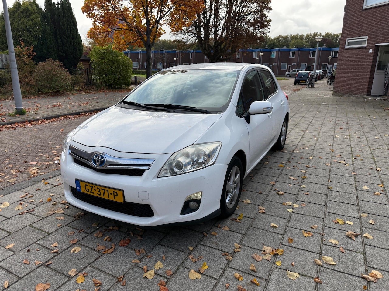 Toyota Auris - 1.8 Full Hybrid Aspiration Snow White - AutoWereld.nl