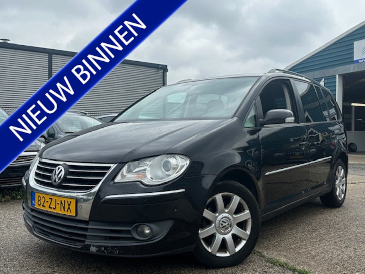 Volkswagen Touran - 2.0 TDi Highline Business | ECC | LMV | Trekhaak - AutoWereld.nl