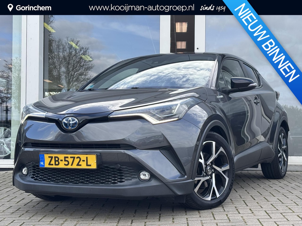 Toyota C-HR - 1.8 Hybrid Bi-Tone | Stoel en stuurverwarming | Navigatie | Blindspot | Toyota garantie to - AutoWereld.nl