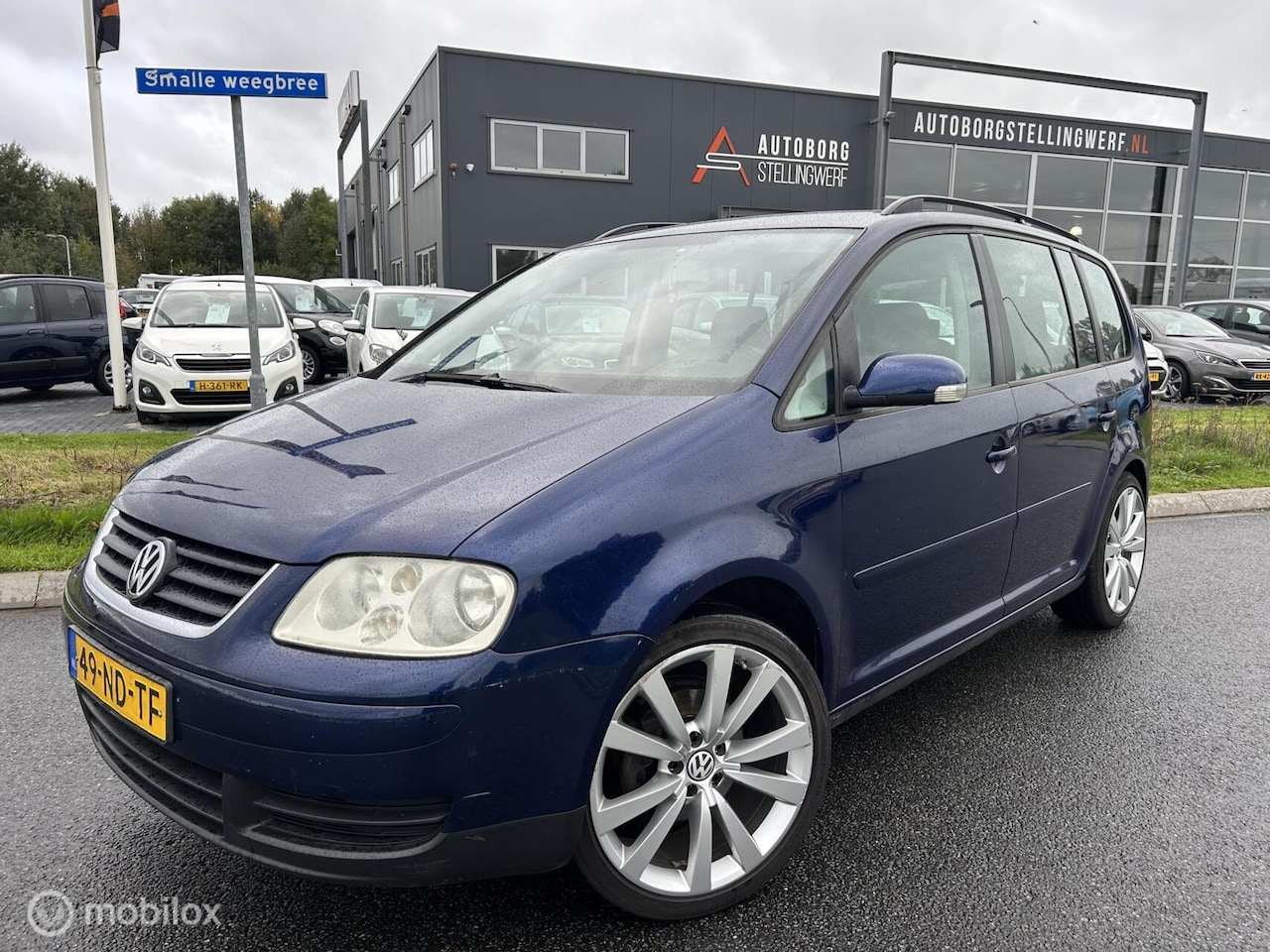 Volkswagen Touran - 1.6-16V FSI 7-persoons [ INRUILKOOPJE ] - AutoWereld.nl