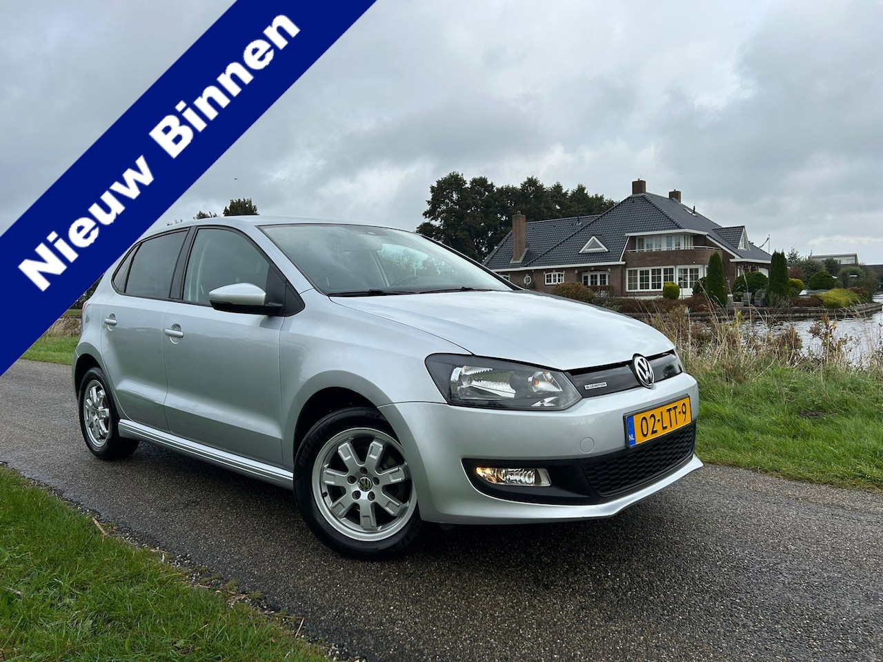 Volkswagen Polo - 1.2 TDI BlueMotion Comfortline Clima / Cruise / Navi / Trekhaak - AutoWereld.nl