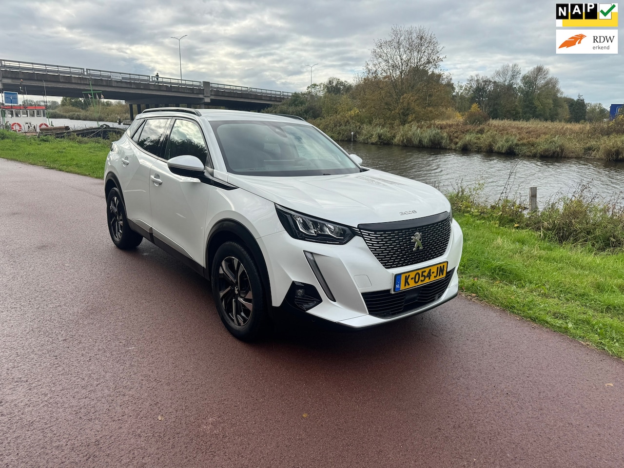 Peugeot 2008 - 1.2 PureTech Blue Lease Allure|Autom.|1e eig|Dis=V.V| - AutoWereld.nl