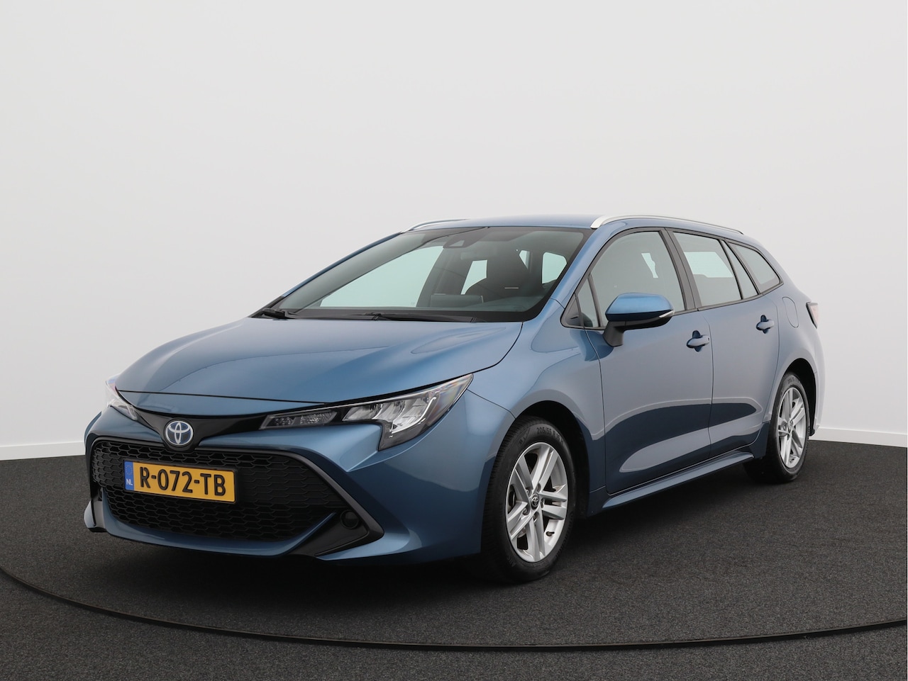Toyota Corolla Touring Sports - 1.8 Hybrid Active/ lage km/ zeer mooi! - AutoWereld.nl