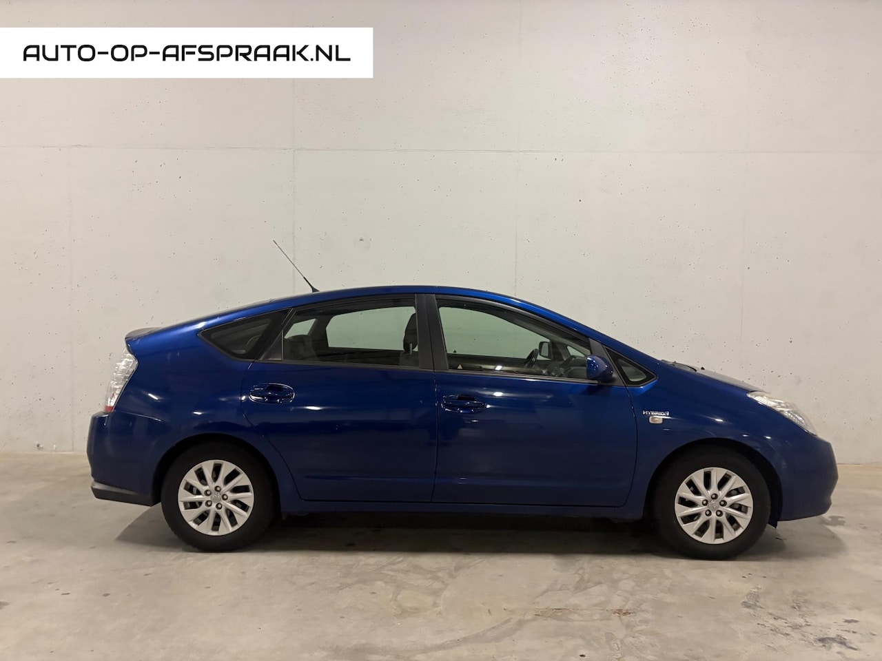 Toyota Prius - 1.5 VVT-i Comfort Clima Cruise APK NAP Navi - AutoWereld.nl