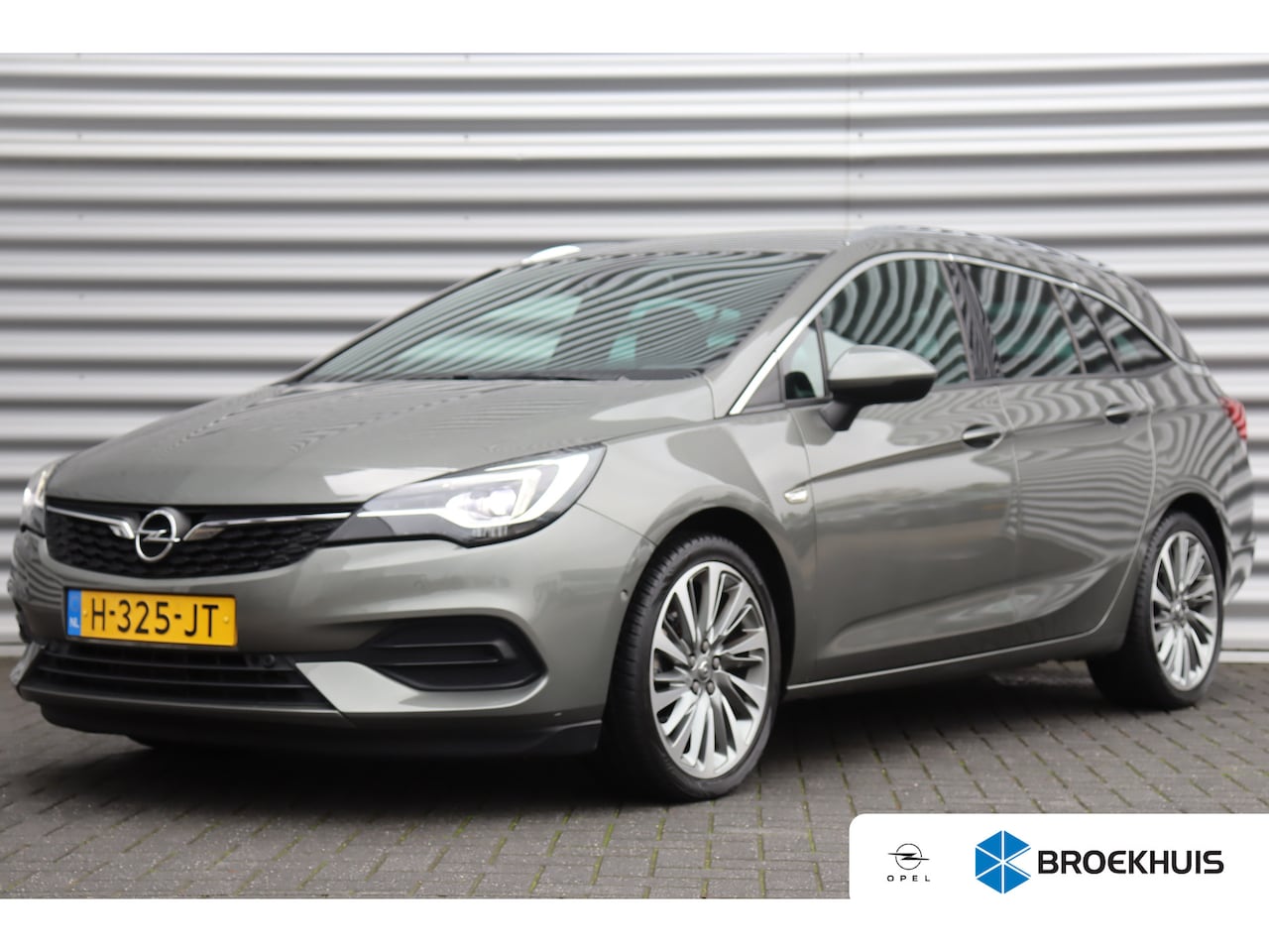 Opel Astra Sports Tourer - 1.2 TURBO 110PK LAUNCH ELEGANCE+ / NAVI / LEDER / CLIMA / FULL-LED / PDC / CAMERA / 18" LM - AutoWereld.nl