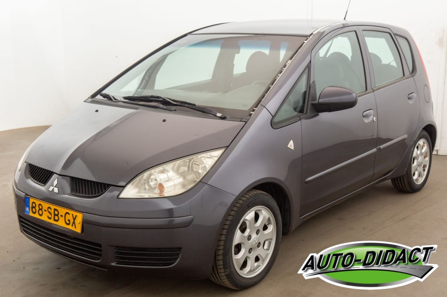 Mitsubishi Colt - 1.3 Invite Airco - AutoWereld.nl