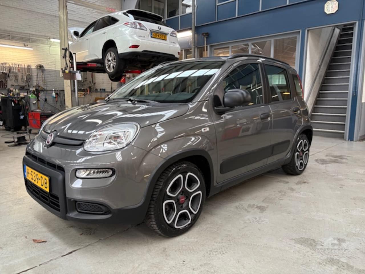 Fiat Panda - 1.0 70pk Hybrid City Life | Airco | U-connect | Bluetooth | All season banden | NAP | Rijk - AutoWereld.nl