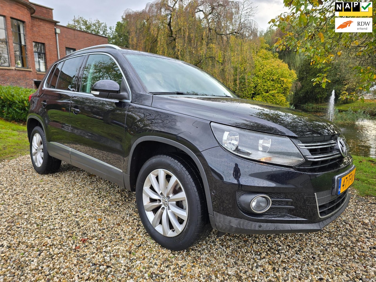 Volkswagen Tiguan - 1.4 TSI Sport&Style AIRCO/cruise - AutoWereld.nl