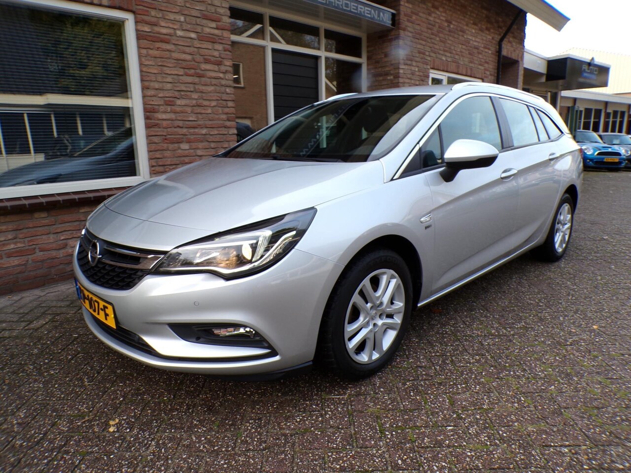 Opel Astra Sports Tourer - 1.0 Business+ Airco / Navi - AutoWereld.nl