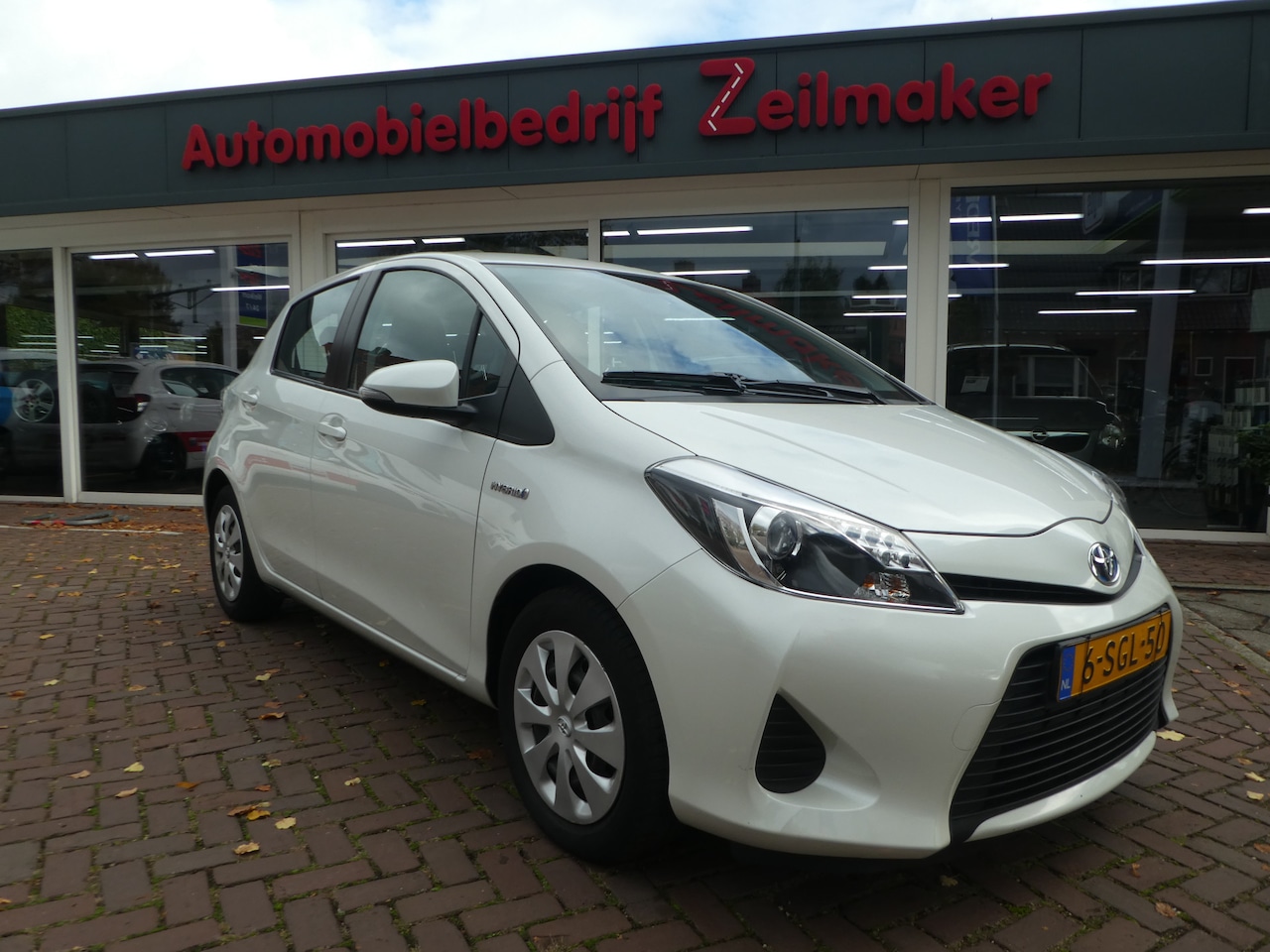 Toyota Yaris - 1.5 Full Hybrid Aspiration Clima, Navi, Camera, Afn,Trekhaak - AutoWereld.nl