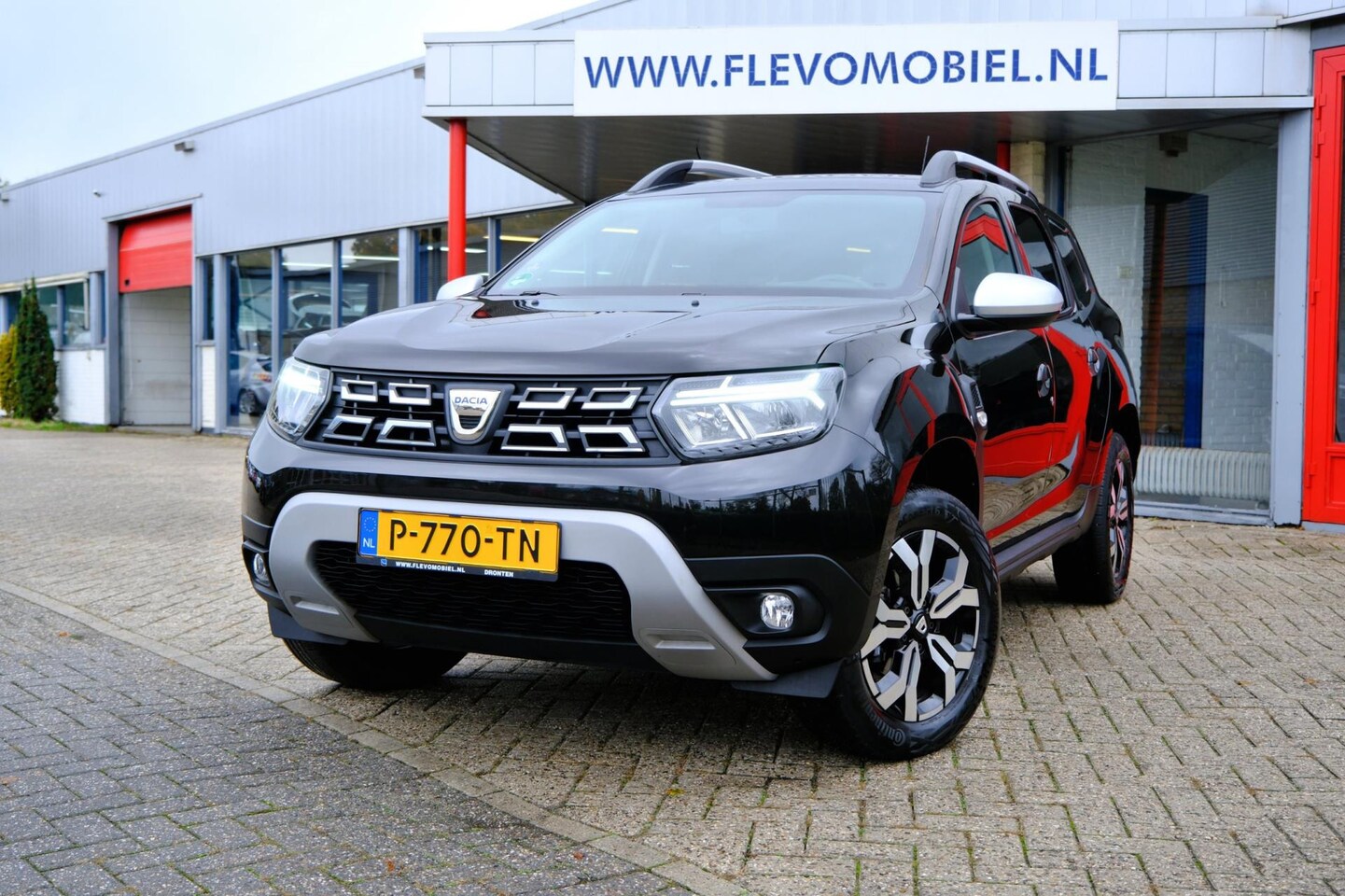 Dacia Duster - 1.0 TCe Bi-Fuel Prestige Navi|1e Eig|Clima|LMV|Cam - AutoWereld.nl