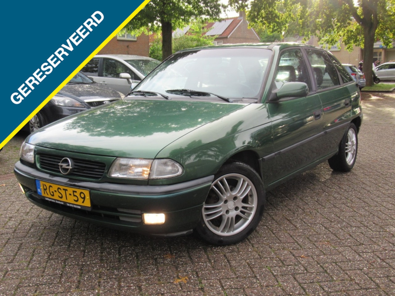 Opel Astra - 1.6i NW Distributieset+schokdempers+banden Klassieker! - AutoWereld.nl