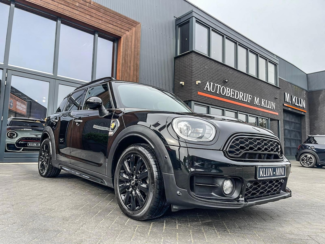 MINI Countryman - Mini 2.0 Cooper S E ALL4 hybrid Chili Blackline 224pk/navi/led/nieuwstaat - AutoWereld.nl