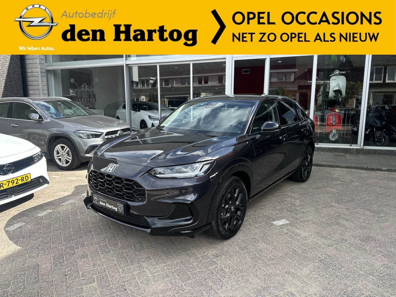 Honda ZR-V - 2.0 e:HEV Sport Electr stoelen/Stoel verwarming/Electr achterklep. - AutoWereld.nl