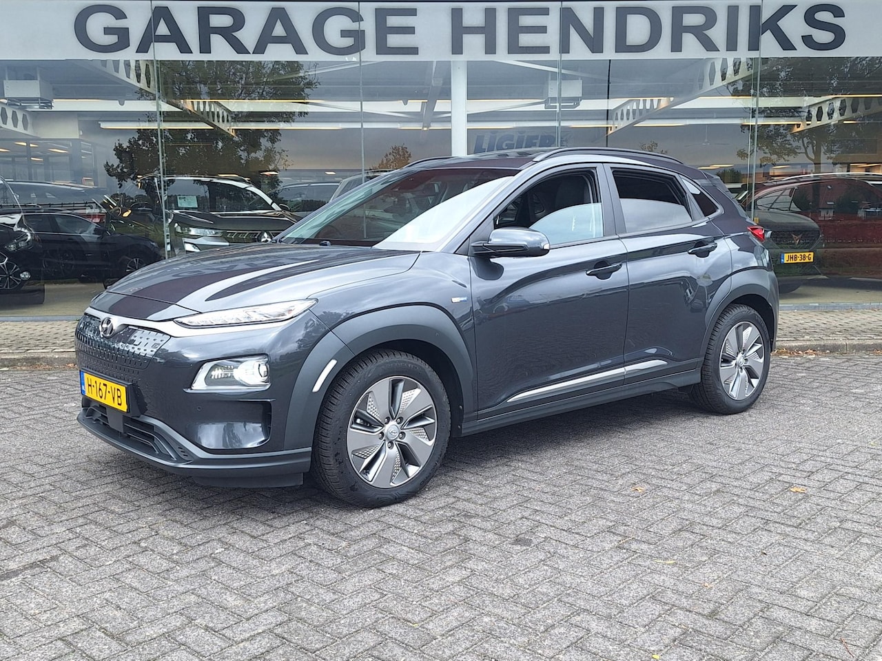 Hyundai Kona Electric - EV Premium Sky 64 kWh | 3 Fase | Warmtepomp | Leder | Schuifdak | occasion - AutoWereld.nl