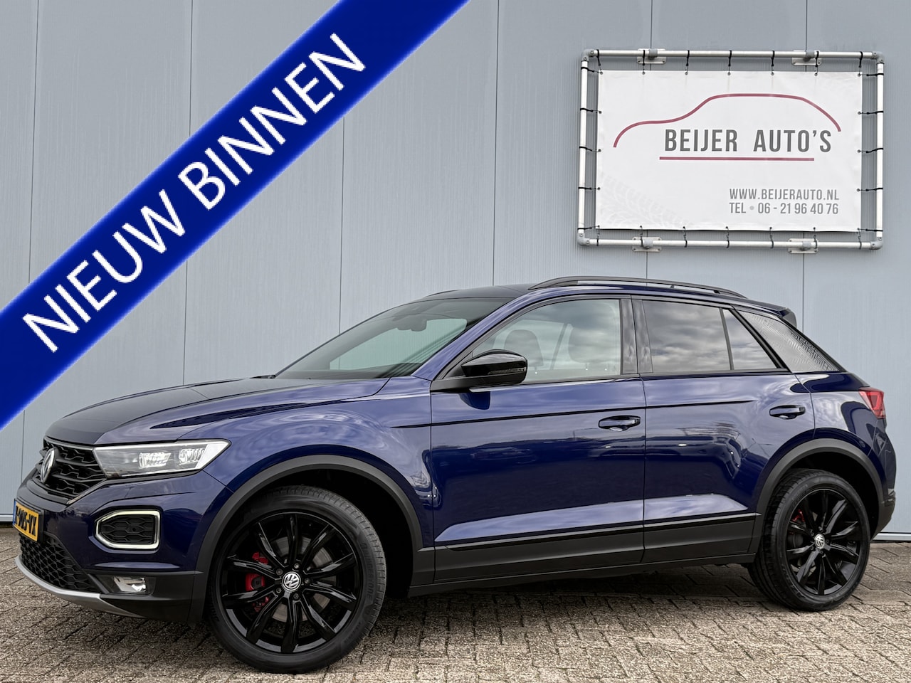 Volkswagen T-Roc - 1.5 TSI Sport Business R Navigatie/Camera. - AutoWereld.nl
