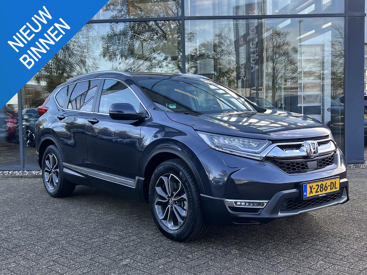Honda CR-V - 2.0 e:HEV Lifestyle AUTOMAAT | STOELVERWARMING | NAVIGATIE | KEYLESS | ACHTERUITRIJCAMERA - AutoWereld.nl