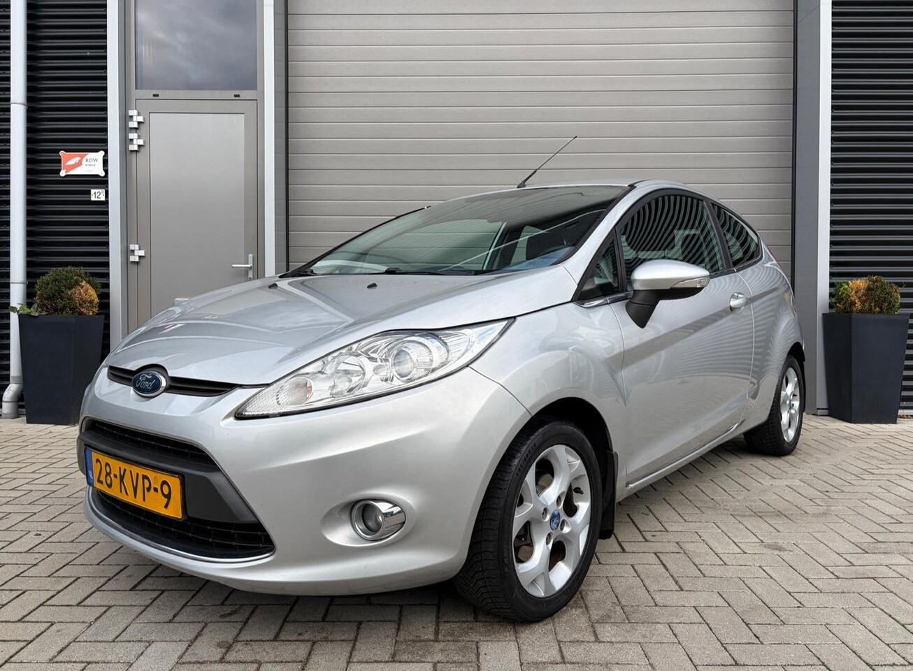 Ford Fiesta - 1.25 Titanium/155.000 NAP/Airco/Lichtmetaal/PDC/ - AutoWereld.nl